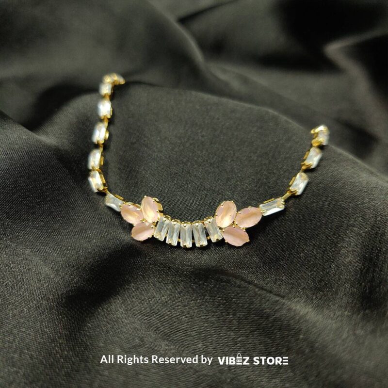 Elegant Rose Pink and Crystal Bracelet – Delicate Floral Design 1 Elegant Rose Pink and Crystal Bracelet with delicate floral design, set in a golden-tone band, from VibezStore