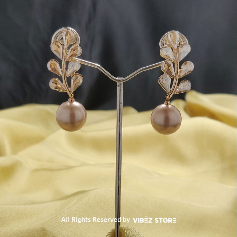Leaf Pearl Drop Earrings – Gold-Tone Elegant Fashion Jewelry 1 Leaf Pearl Drop Earrings with gold-tone settings, delicate leaf design, and smooth pearl drops from VibezStore