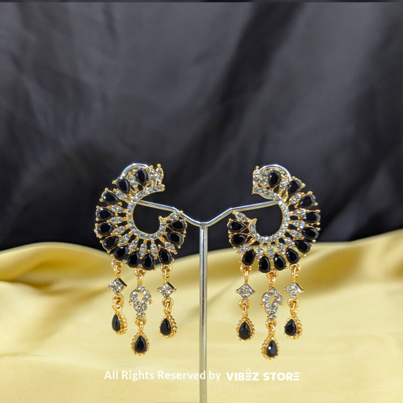 Elegant Teardrop Dangle Earrings 1 Teardrop dangle earrings in crescent design with crystal details, shown in pink and black color variations by Vibez Store.