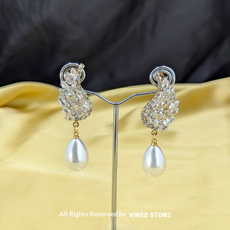Elegant Crystal Wing Pearl Drop Earrings 1 Crystal wing earrings with a pearl drop, designed elegantly for formal occasions, displayed by Vibez Store.