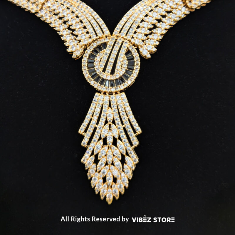 Luxurious Crystal Wings Jewelry Set 1 Crystal wings jewelry set featuring a necklace, earrings, bracelet, and ring, elegantly displayed by Vibez Store.