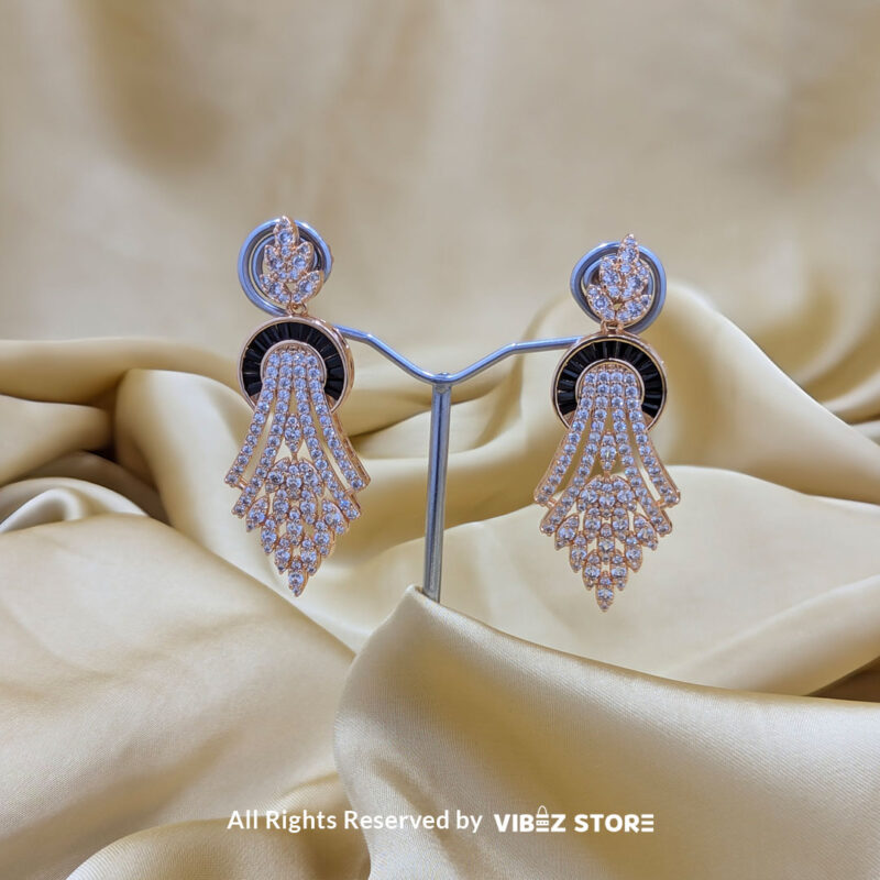 Luxurious Crystal Wings Jewelry Set 5 Crystal wings jewelry set featuring a necklace, earrings, bracelet, and ring, elegantly displayed by Vibez Store.