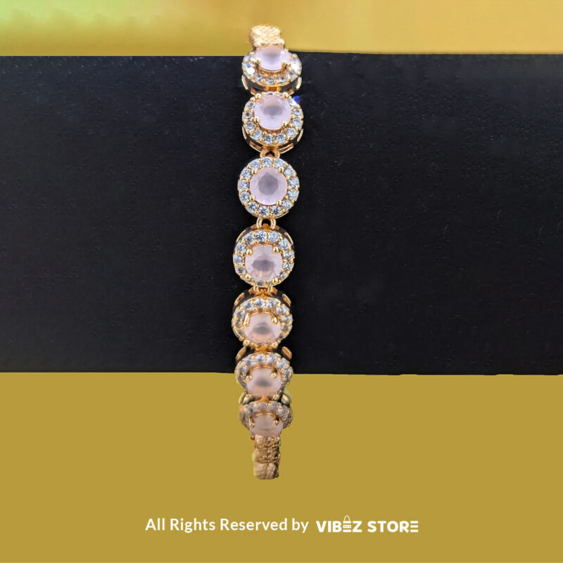 Elegant Rose Quartz Jewelry Set 4 Gold-tone jewelry set with rose quartz-inspired stones, including a necklace, earrings, bracelet, and ring, elegantly displayed by Vibez Store.