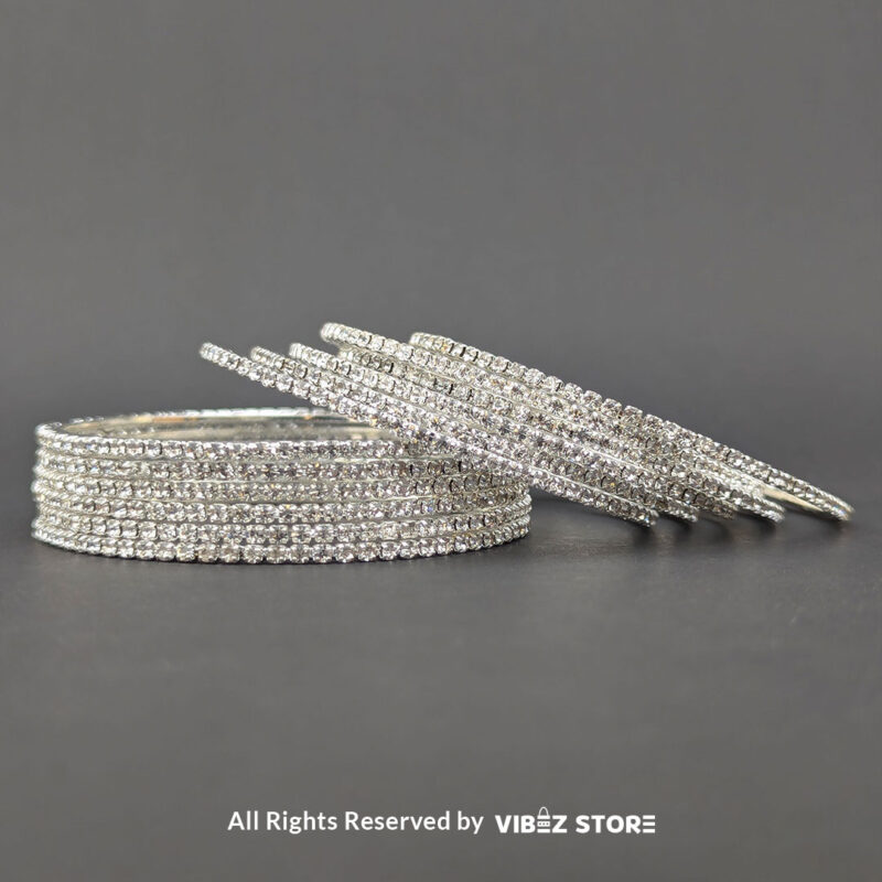Elegant Silver Sparkle Stacked Bangle Set 1 Silver sparkle stacked bangle set with a shimmering design, displayed elegantly by Vibez Store.