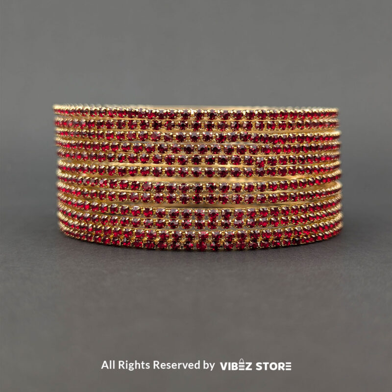 Elegant Red and Gold Stacked Bangle Set 3 Red and gold bangle set with intricate stone details, displayed elegantly by Vibez Store.