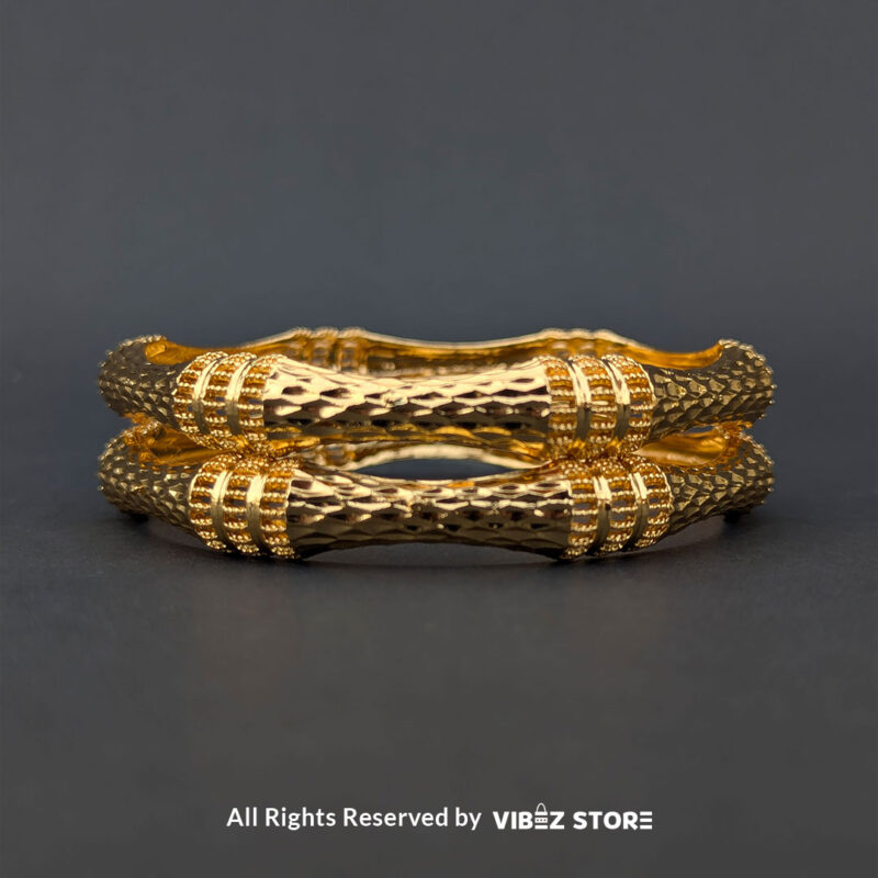 Textured Gold-Tone Twisted Bangle Pair 3 Pair of gold-tone twisted bangles with a textured finish, displayed elegantly by Vibez Store.