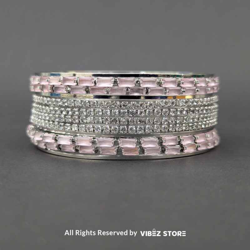 Pink Crystal Silver Bangles Set 3 Silver bangles set with pink rectangular crystals and shimmering white stones.