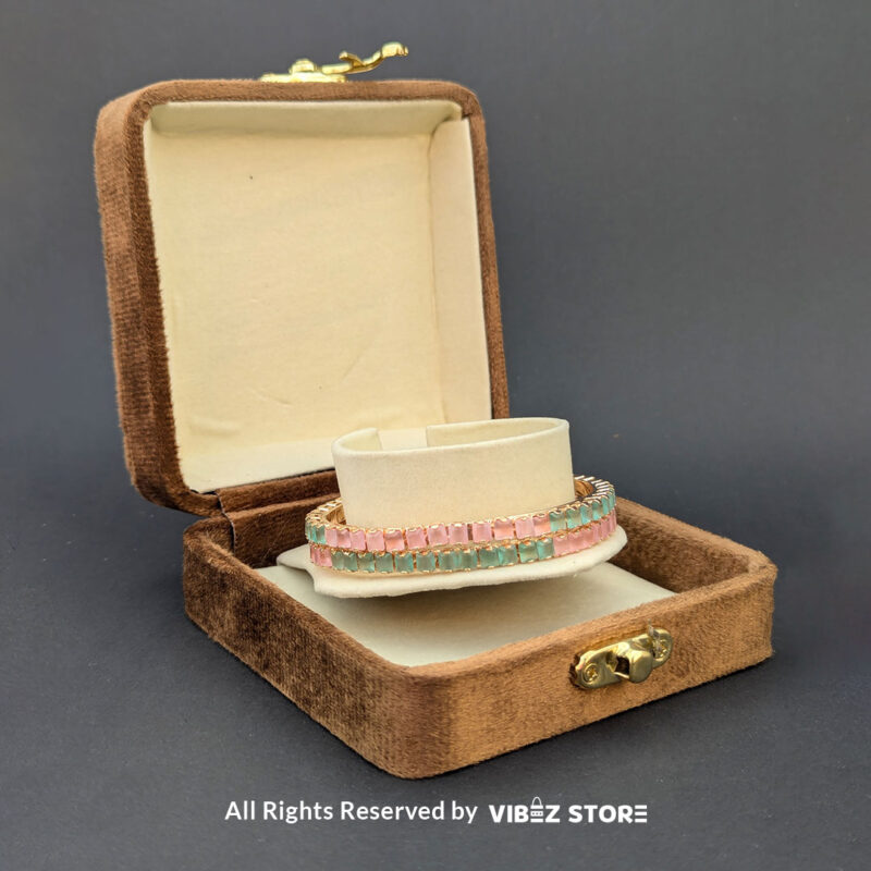 Pastel Pink & Green Gold Bangles Set 2 Pastel pink and green gold bangles set for festive and casual wear.