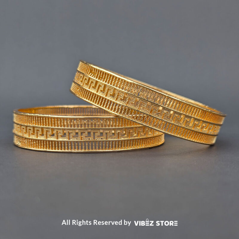 Elegant Greek Key Gold-Tone Bangle Pair 1 Pair of gold-tone bangles with Greek key pattern, displayed elegantly by Vibez Store.