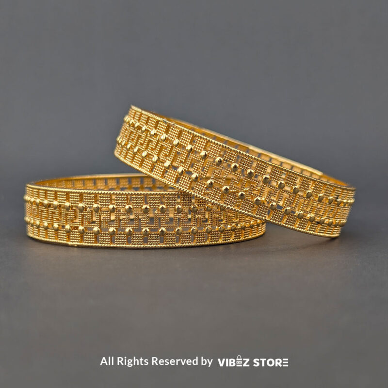 Classic Textured Artificial Gold Bangle 1 Artificial gold bangle with textured design, displayed elegantly by Vibez Store