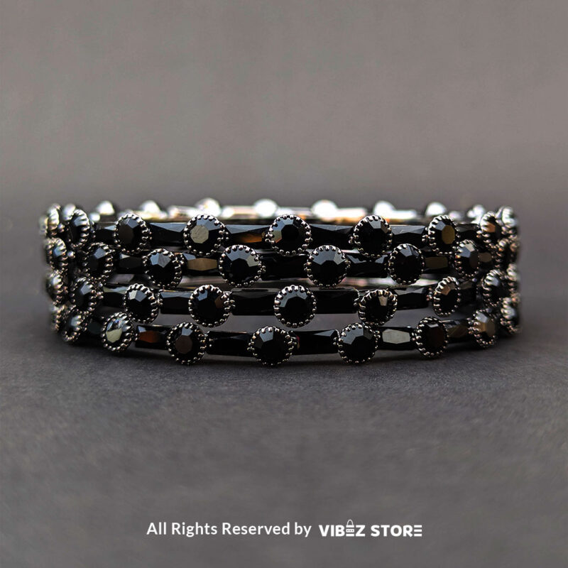 Elegant Black Stone Bangle 3 Black stone bangle with circular stone pattern, displayed elegantly by Vibez Store