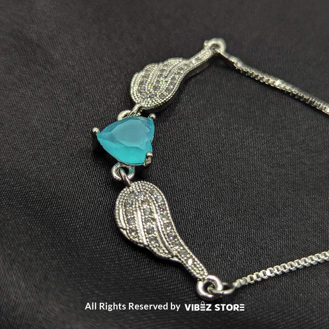 BRS-18 Silver Adjustable Bracelet with Teardrop Turquoise Stone - Image 1