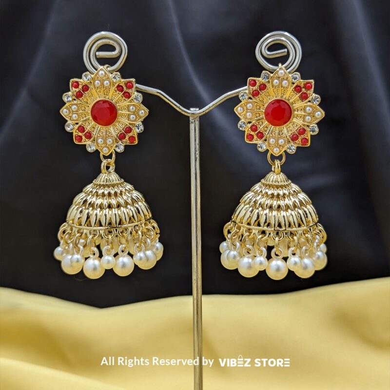 Gold-Tone Jhumka Earrings with Pearl Drops 1 Gold-tone jhumka earrings with floral motifs, pearl drops, and a secure push-back closure, displayed with intricate detailing and a traditional design.