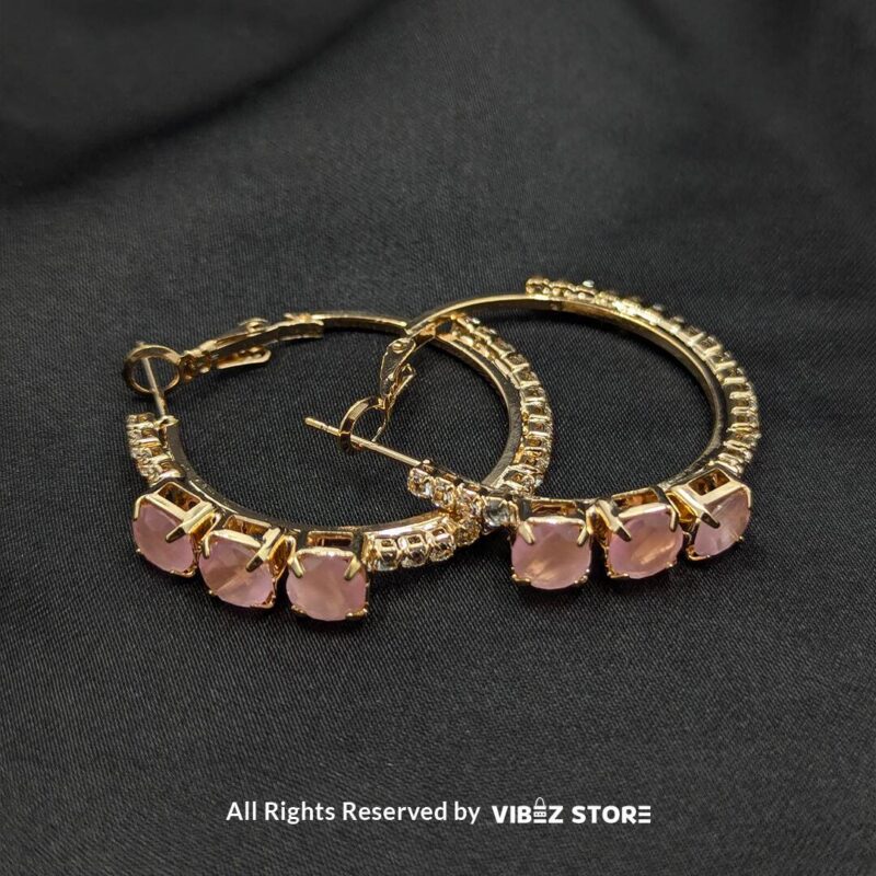 Gold-Plated Hoop Earrings with Pink Stones 1 Gold-plated hoop earrings with pink stones and crystal accents, perfect for formal and casual occasions.