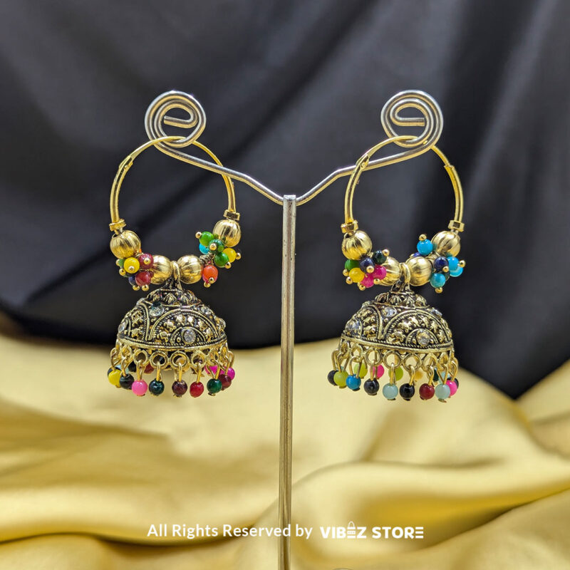 Traditional Gold-Tone Jhumka Earrings with Multicolor Beads 1 Traditional gold-tone jhumka earrings with intricate detailing and multicolor bead embellishments, ideal for ethnic wear.