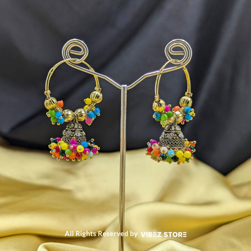 Colorful Festive Jhumka Earrings with Multicolor Beads 1 Gold-tone jhumka earrings with vibrant multicolor beads, ideal for festive and wedding occasions.