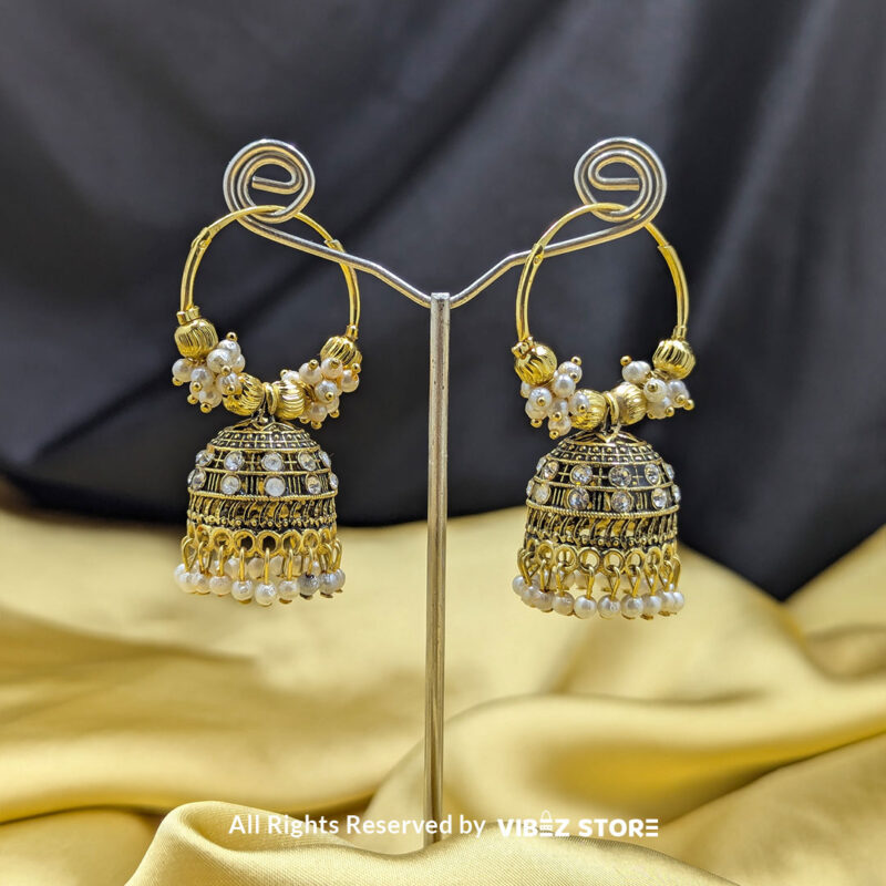 Elegant Hoop Jhumka Earrings with Pearl and Golden Detailing 1 Elegant hoop Jhumka earrings with golden detailing and faux pearls in white and beige variations.