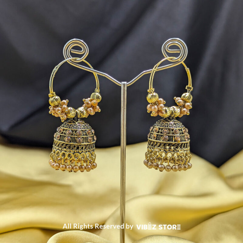 Elegant Hoop Jhumka Earrings with Pearl and Golden Detailing 2 Elegant hoop Jhumka earrings with golden detailing and faux pearls in white and beige variations.