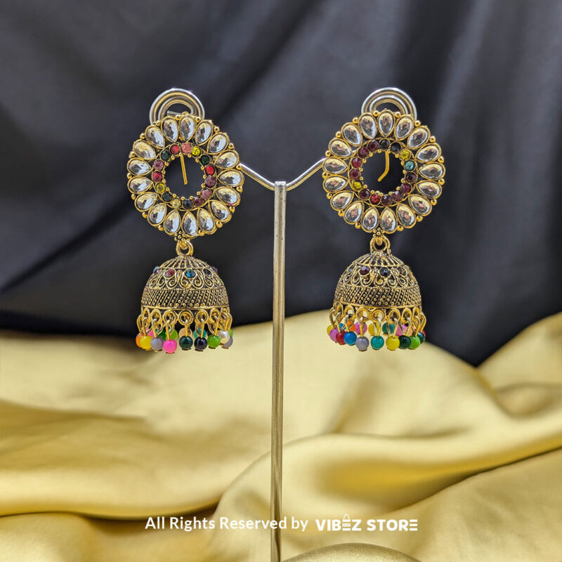 Kundan Polki Jhumka Earrings with Multicolor Beads 1 Kundan polki jhumka earrings with multicolor beads and intricate gold-tone detailing.