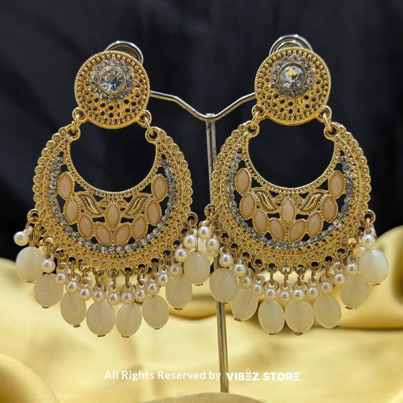 Vintage Pearl Drop Earrings 1 Vintage Pearl Drop Earrings with intricate gold-toned detailing, floral accents, and pearl drops, perfect for traditional occasions.