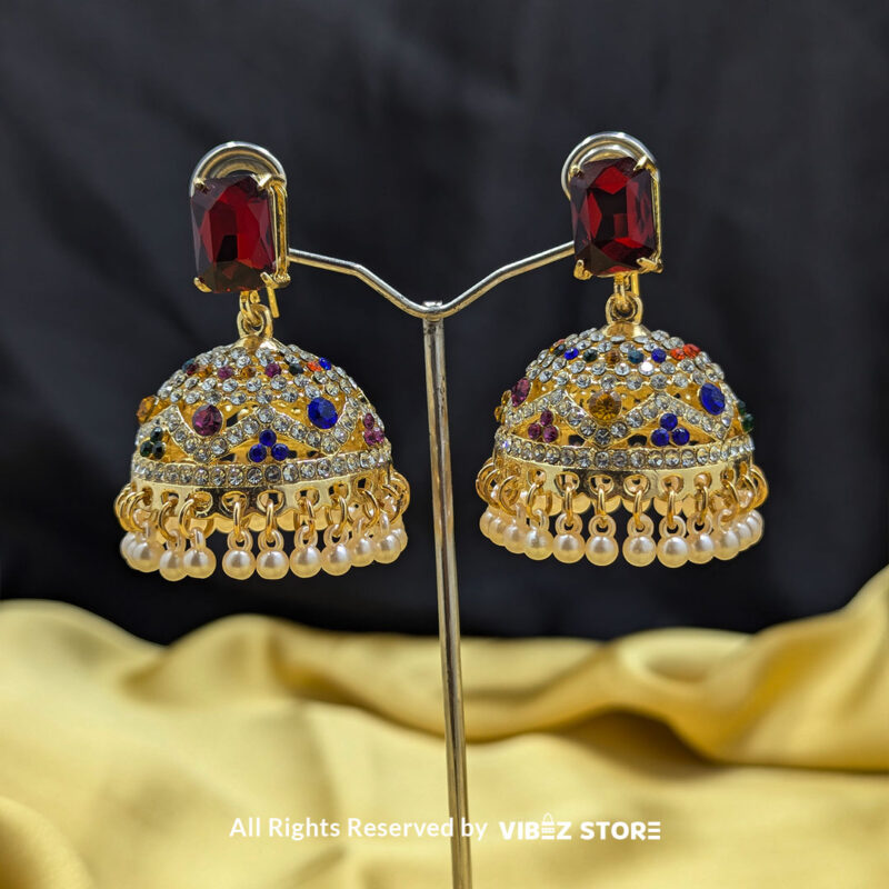 Multicolor Jhumka Earrings with Pearl Detailing 1 Multicolor Jhumka Earrings with sparkling gemstones, gold-toned detailing, and pearl drops, perfect for traditional and festive occasions.