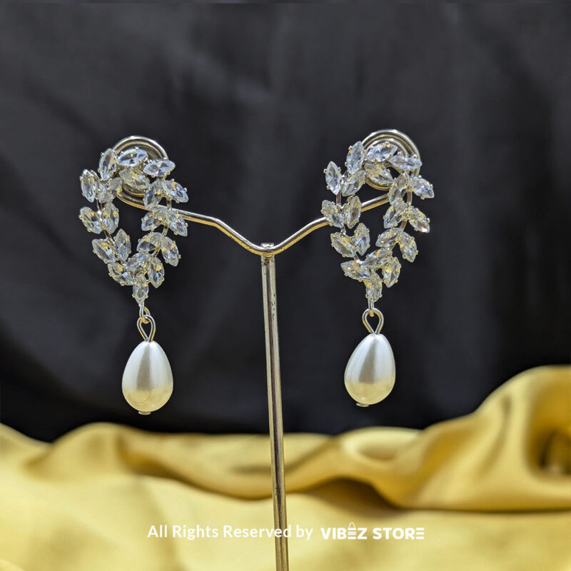 Crystal Leaf and Pearl Drop Earrings 1 Crystal leaf earrings with teardrop pearl detailing, ideal for weddings and special occasions.