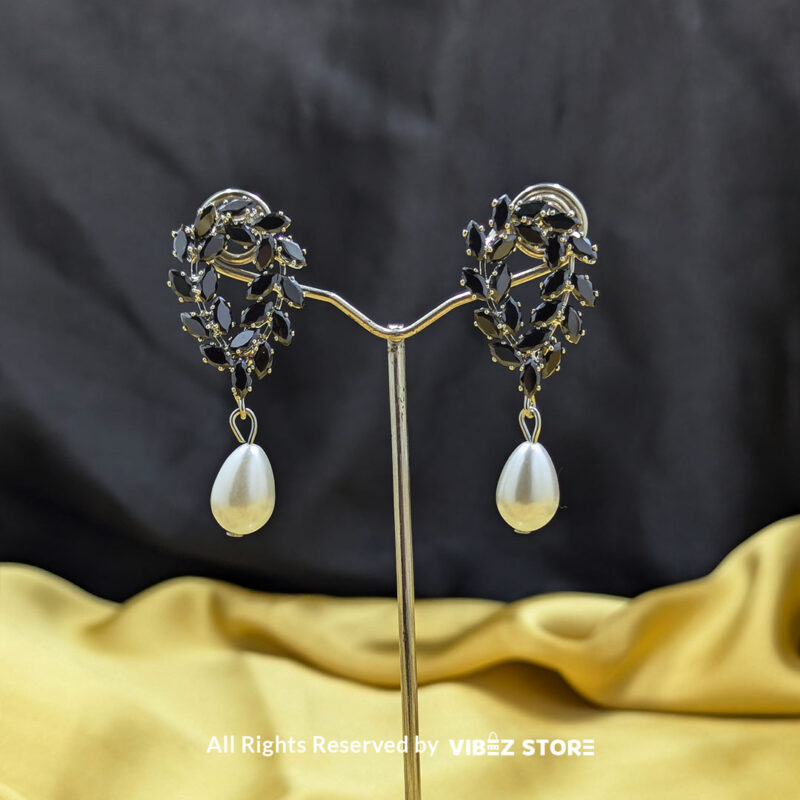 Crystal Leaf and Pearl Drop Earrings 3 Crystal leaf earrings with teardrop pearl detailing, ideal for weddings and special occasions.