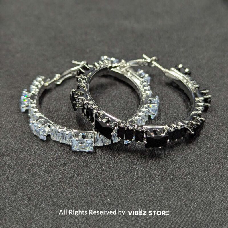Black and White Crystal Hoop Earrings 1 Elegant black and white crystal hoop earrings, perfect for a bold and sophisticated look.