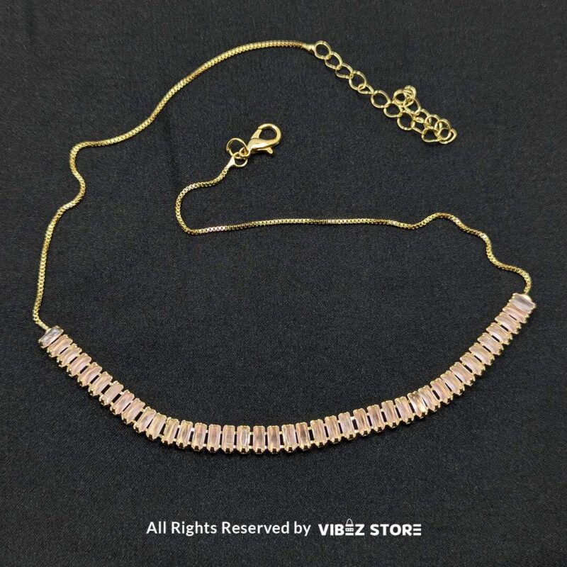 Elegant Pink Crystal Jewelry Set 4 Pink crystal jewelry set featuring a necklace, bracelet, ring, and earrings with baguette-style crystals.