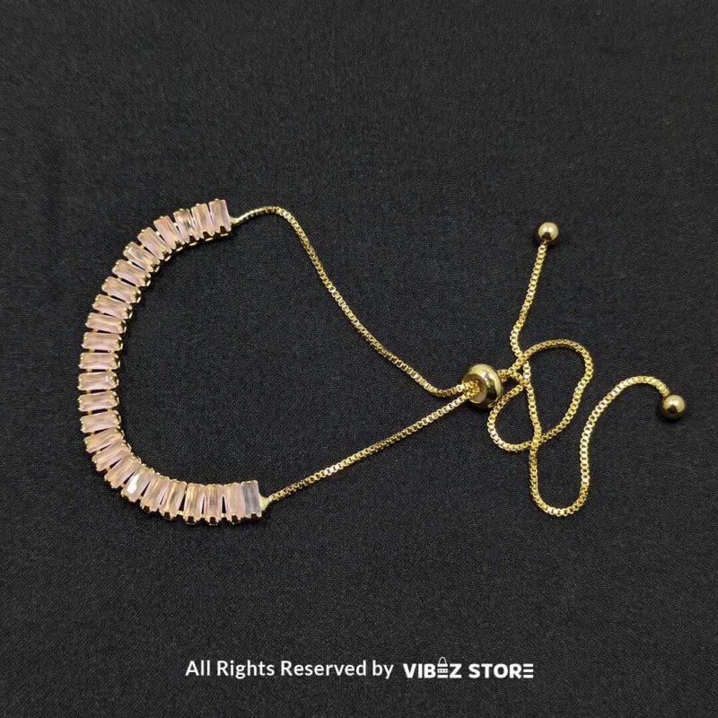 Elegant Pink Crystal Jewelry Set 2 Pink crystal jewelry set featuring a necklace, bracelet, ring, and earrings with baguette-style crystals.