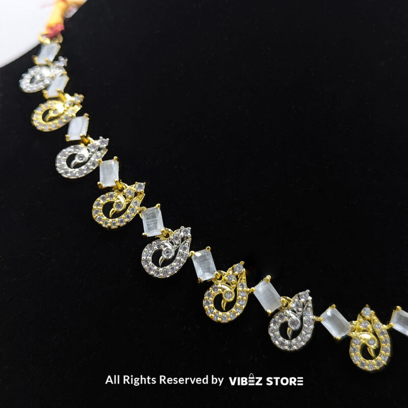 Crystal Swirl Statement Necklace Gold-Tone & White Gemstone Jewelry 4 Crystal Swirl Necklace and Earring Set with gold-tone accents and crystal swirl designs from VibezStore