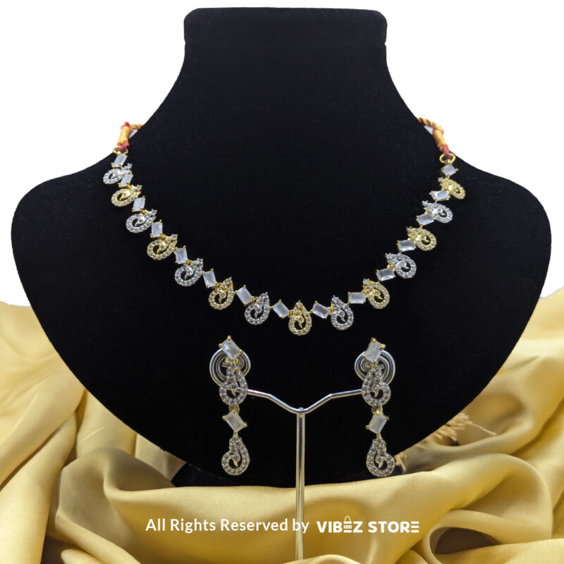 Crystal Swirl Statement Necklace Gold-Tone & White Gemstone Jewelry 1 Crystal Swirl Necklace and Earring Set with gold-tone accents and crystal swirl designs from VibezStore