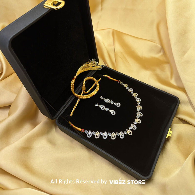 Crystal Swirl Statement Necklace Gold-Tone & White Gemstone Jewelry 3 Crystal Swirl Necklace and Earring Set with gold-tone accents and crystal swirl designs from VibezStore