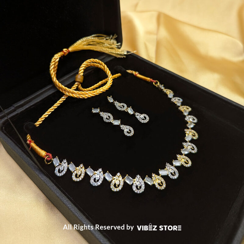 Crystal Swirl Statement Necklace Gold-Tone & White Gemstone Jewelry 2 Crystal Swirl Necklace and Earring Set with gold-tone accents and crystal swirl designs from VibezStore