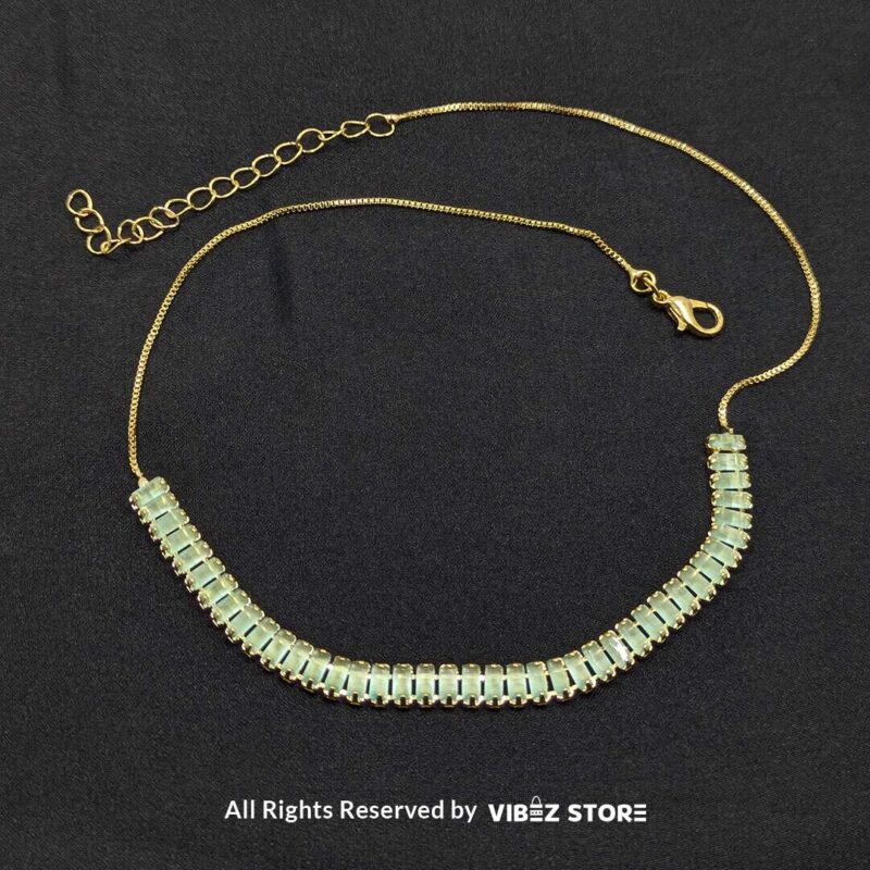 Mint Green Crystal Jewelry Set 4 Mint green crystal jewelry set with a necklace, bracelet, ring, and earrings featuring baguette-style crystals.