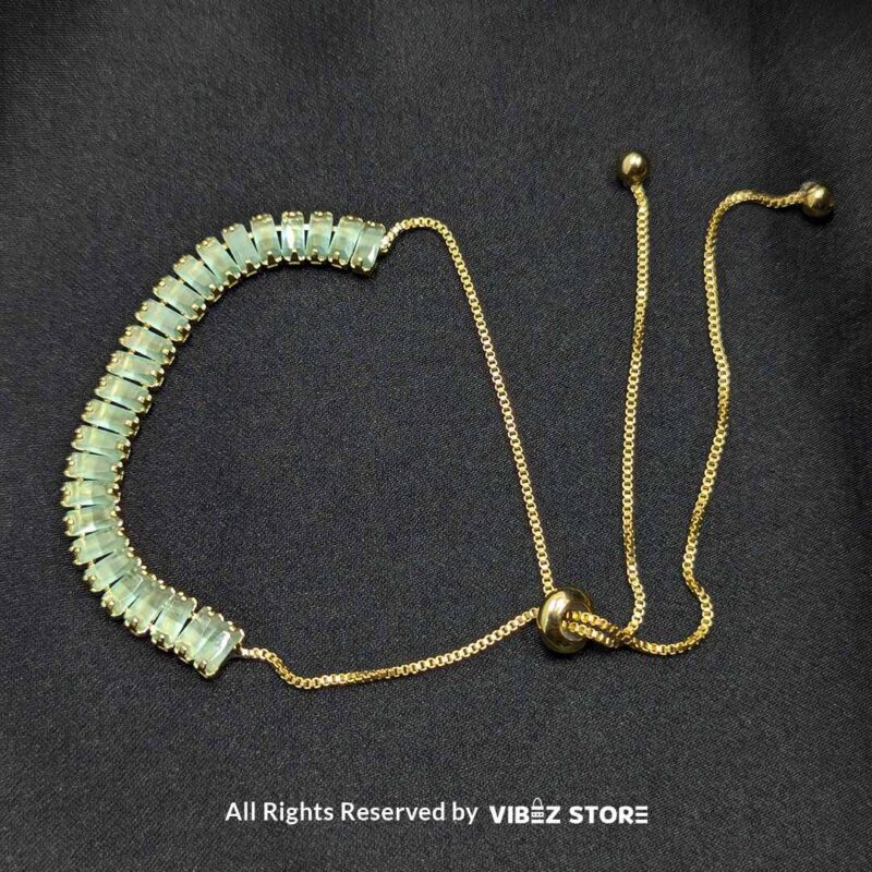 Mint Green Crystal Jewelry Set 2 Mint green crystal jewelry set with a necklace, bracelet, ring, and earrings featuring baguette-style crystals.