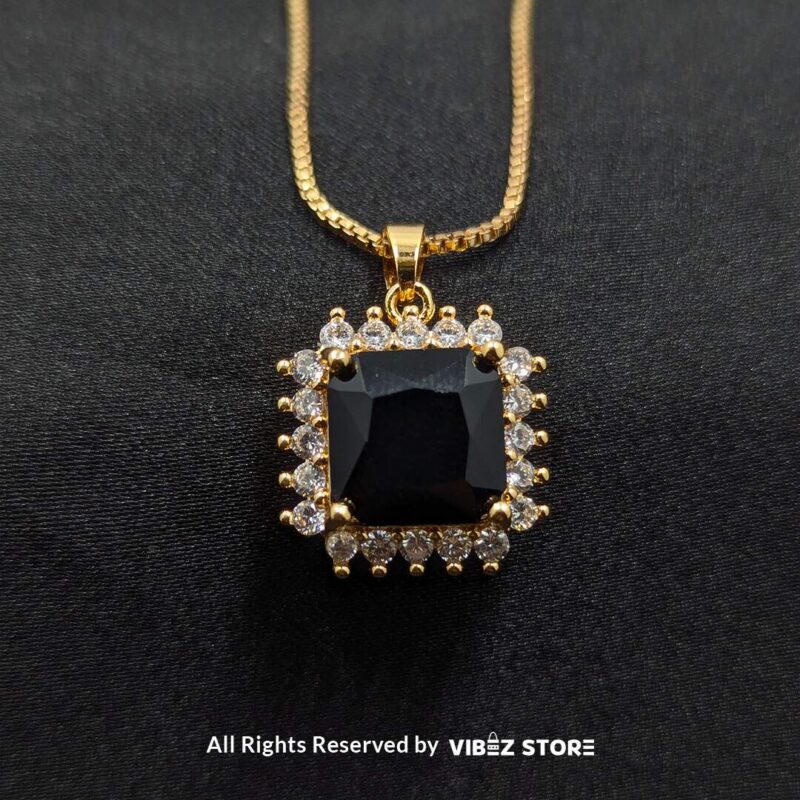 Black Square Pendant Jewelry Set 2 Black square pendant jewelry set featuring a necklace with a gold chain and matching stud earrings adorned with cubic zirconia.