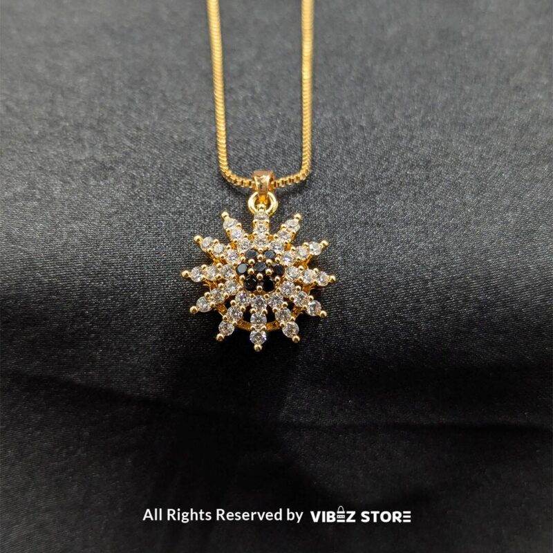 Radiant Sunflower Pendant and Earrings Set 1 Radiant sunflower-inspired pendant and matching earrings set, crafted with sparkling crystals on a sleek black backdrop.