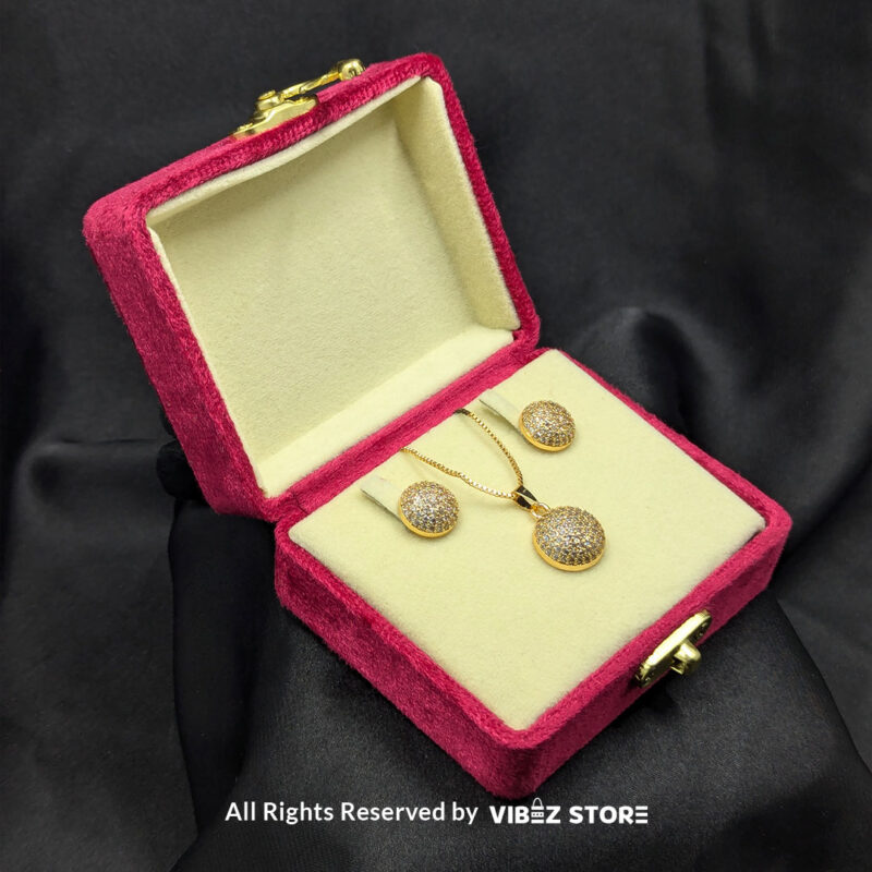 Sparkle Sphere Pendant and Earrings Set (Available in Multiple Colors) 1 Sphere-shaped pendant and earrings set featuring shimmering crystals, displayed on a sleek black backdrop. Available in multiple color variations.
