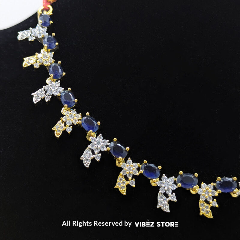 Sapphire Floral Drop Necklace Gold Tone & Crystal Jewelry 4 Sapphire Floral Necklace and Earring Set with gold-tone settings, faux sapphire stones, and crystal floral designs from VibezStore
