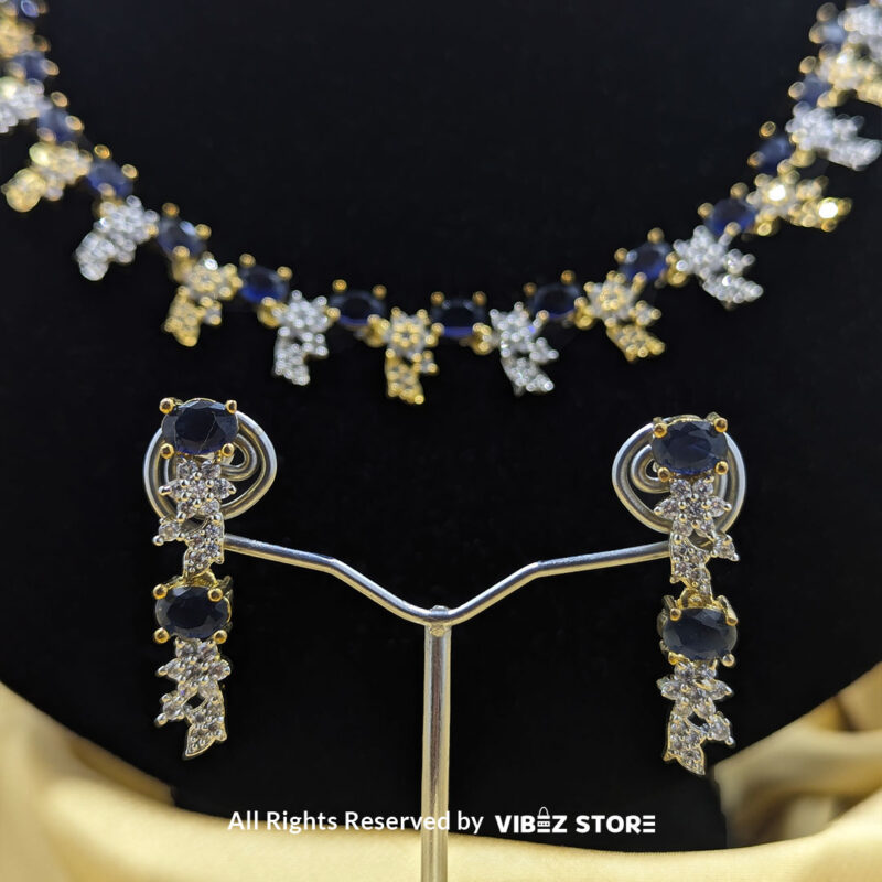 Sapphire Floral Drop Necklace Gold Tone & Crystal Jewelry 5 Sapphire Floral Necklace and Earring Set with gold-tone settings, faux sapphire stones, and crystal floral designs from VibezStore