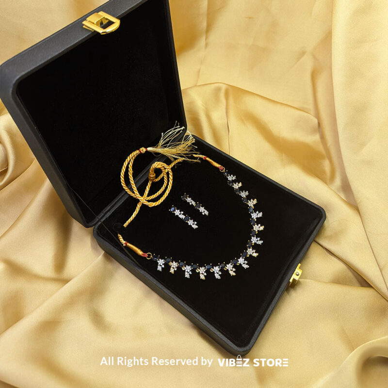 Sapphire Floral Drop Necklace Gold Tone & Crystal Jewelry 3 Sapphire Floral Necklace and Earring Set with gold-tone settings, faux sapphire stones, and crystal floral designs from VibezStore
