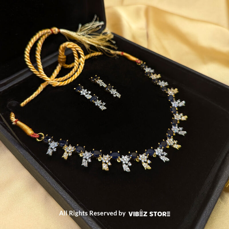 Sapphire Floral Drop Necklace Gold Tone & Crystal Jewelry 2 Sapphire Floral Necklace and Earring Set with gold-tone settings, faux sapphire stones, and crystal floral designs from VibezStore