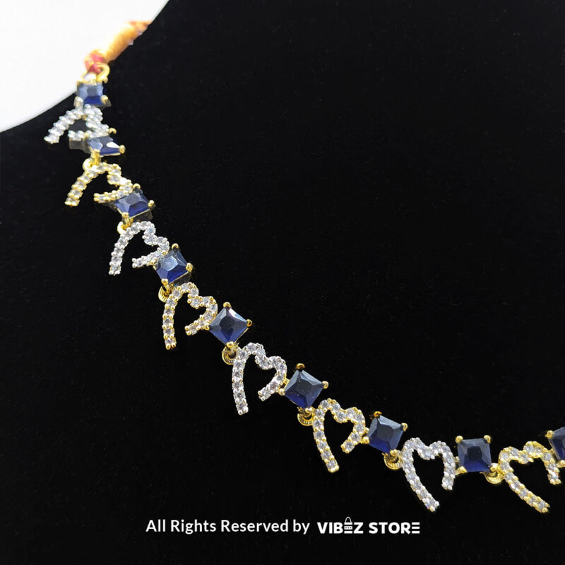 Heart & Sapphire Necklace & Earring Set Gold-Tone Crystal Jewelry 4 Heart & Sapphire Necklace and Earring Set with gold-tone settings, faux sapphire stones, and crystal heart motifs from VibezStore