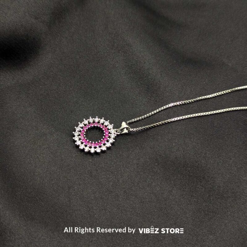 Round Cluster Crystal Lockets - Elegant Jewelry Collection 3 Three round cluster crystal lockets in gold, silver, and silver-pink designs displayed elegantly on a black fabric background.