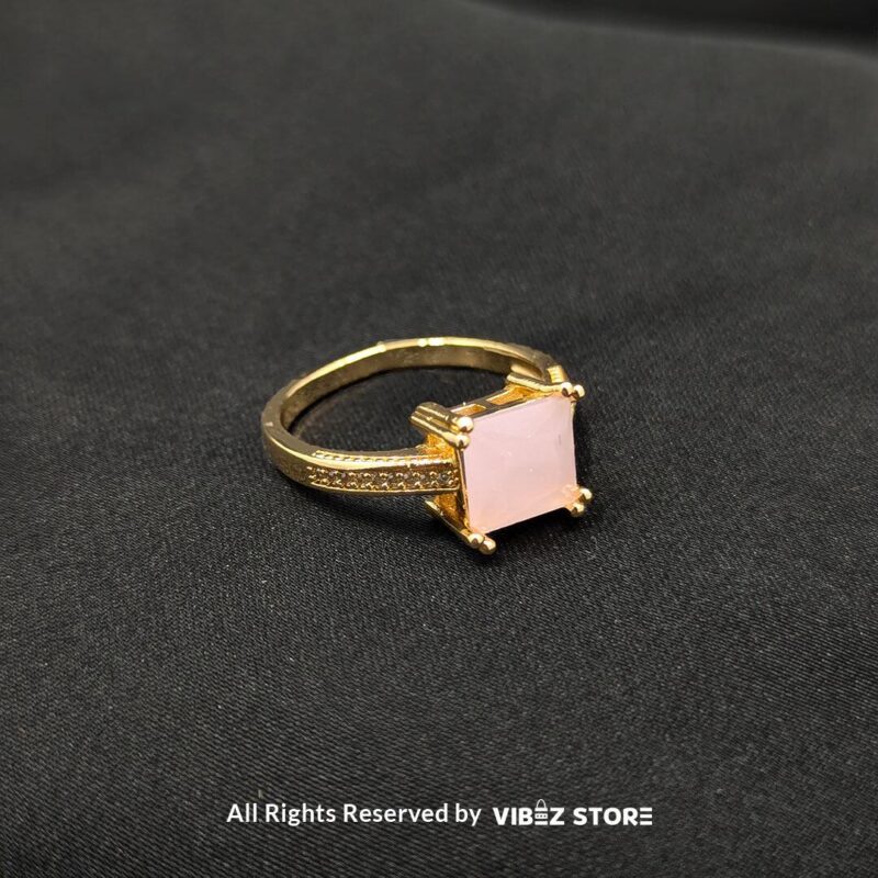 Luxurious Multi-Color Gemstone Rings (Gold-Tone) 8 Gold-tone non-adjustable rings with square gemstones in multiple colors, including rose pink, aqua blue, emerald green, ruby red, black, crystal white, and amber gold, beautifully displayed by Vibez Store.