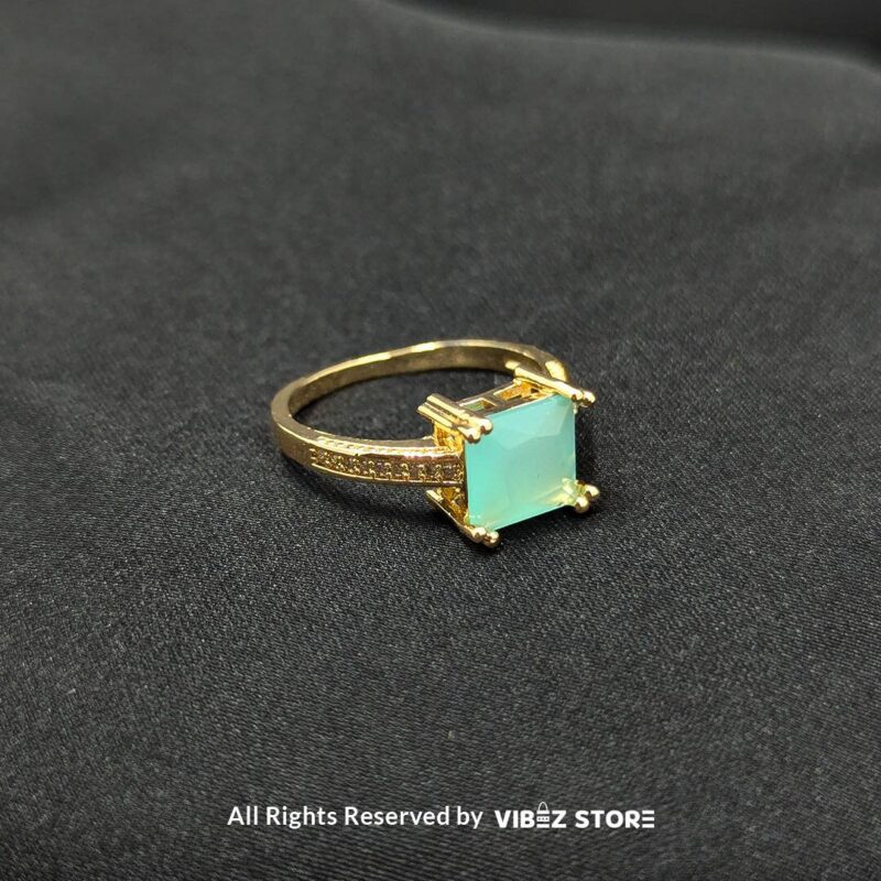 Luxurious Multi-Color Gemstone Rings (Gold-Tone) 2 Gold-tone non-adjustable rings with square gemstones in multiple colors, including rose pink, aqua blue, emerald green, ruby red, black, crystal white, and amber gold, beautifully displayed by Vibez Store.