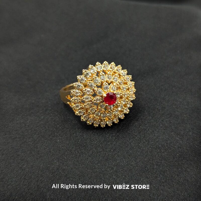 Radiant Floral Crystal Rings 2 Gold-tone floral rings with crystal accents and central gemstones in jet black, ruby red, and champagne gold, beautifully displayed by Vibez Store.