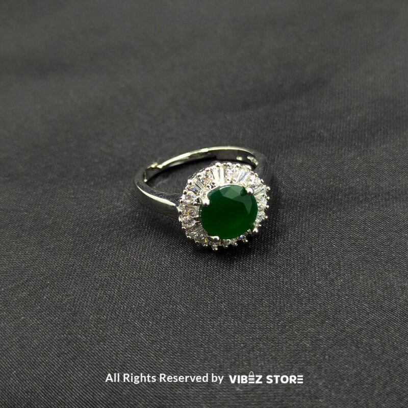 Elegant Halo Gemstone Adjustable Rings 3 Silver-tone halo rings with radiant gemstones in emerald green, rose pink, and aquamarine blue, encircled by sparkling crystals, showcased by Vibez Store.