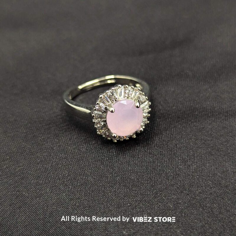 Elegant Halo Gemstone Adjustable Rings 2 Silver-tone halo rings with radiant gemstones in emerald green, rose pink, and aquamarine blue, encircled by sparkling crystals, showcased by Vibez Store.